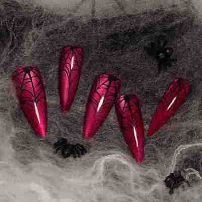 أظافر صناعية حمراء بتصميم عين  - مراجعة Nail Art Red وسعره